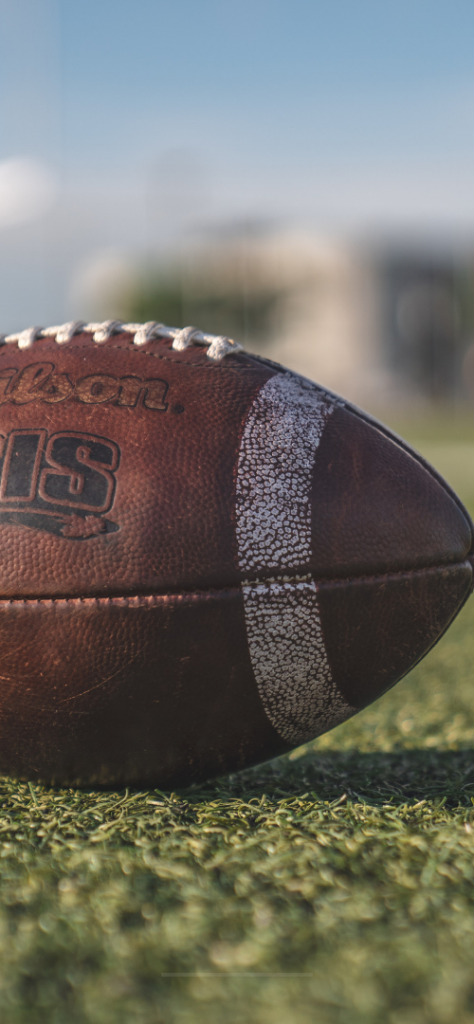 Close-up of football on grass